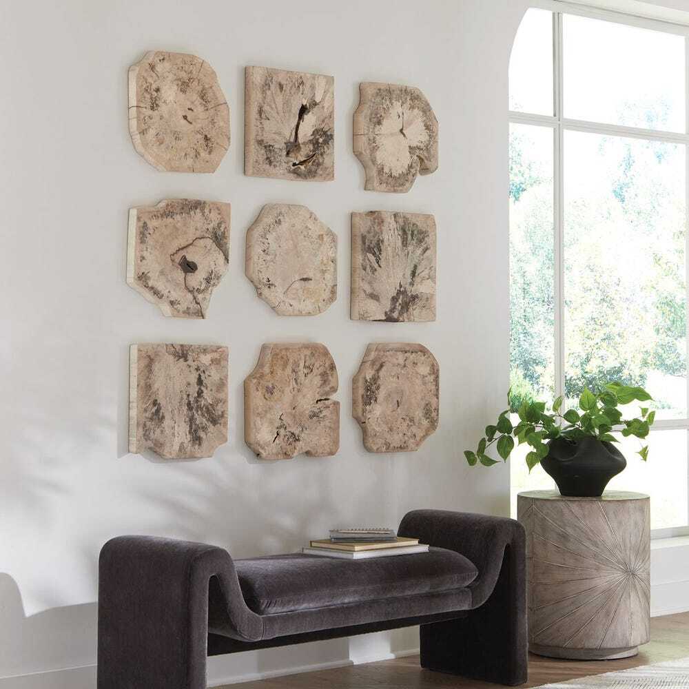 Nine wood wall pieces is crafted from 100% natural tamarind wood in a light bleached finish