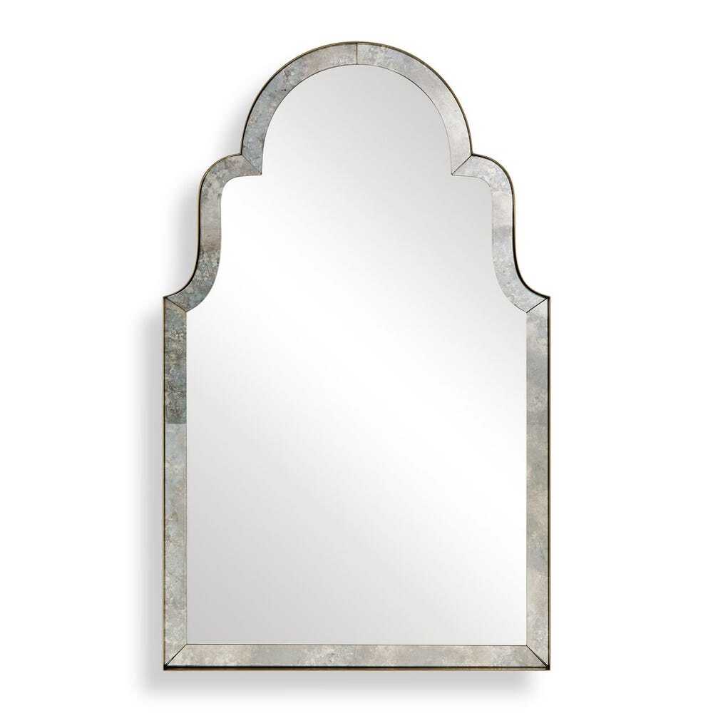 Antique-style arch mirror with silver frame and curved top