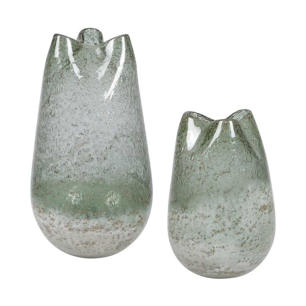 two green glazed ceramic vases with petal-like openings