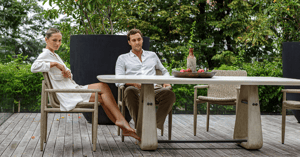 couple sitting at outdoor dining table