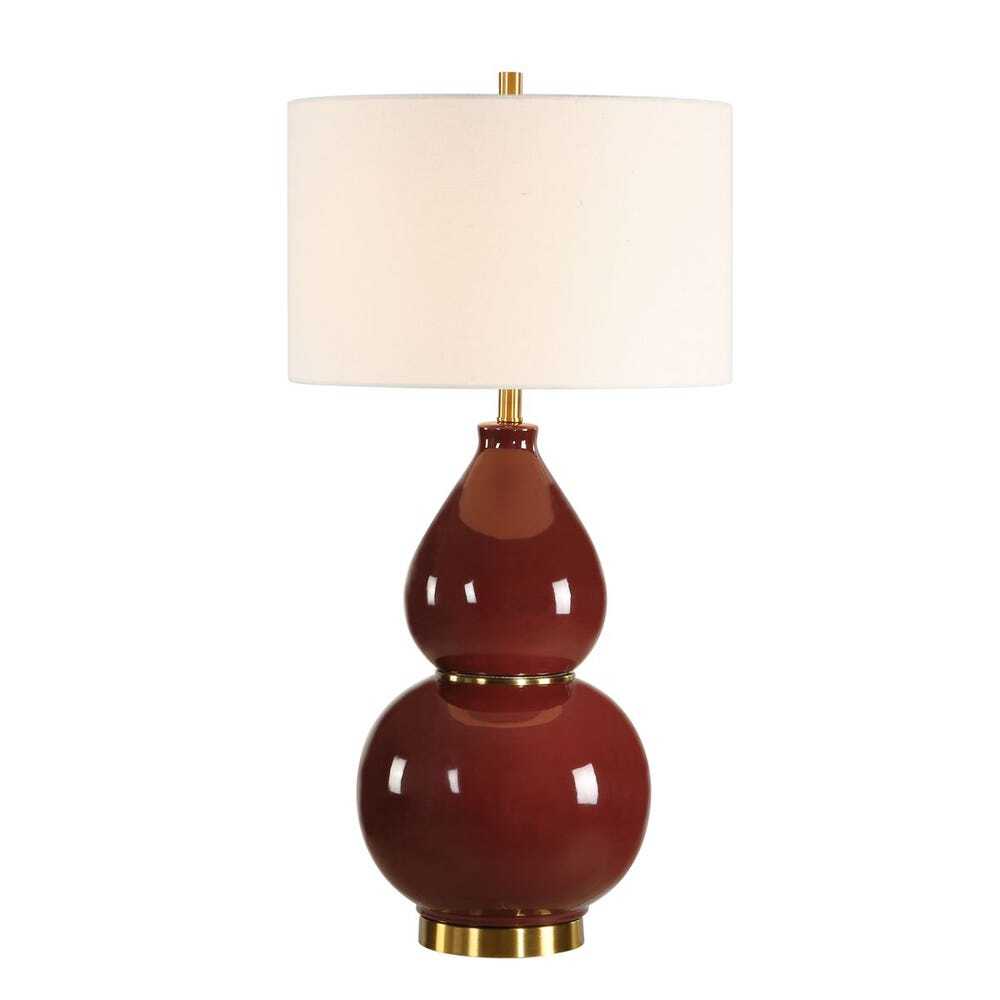 Dark burgundy table lamp with cream shade