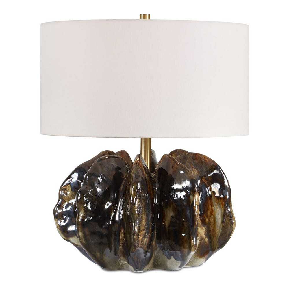 Table lamp with a glossy sculptural brown ceramic base and a white drum shade