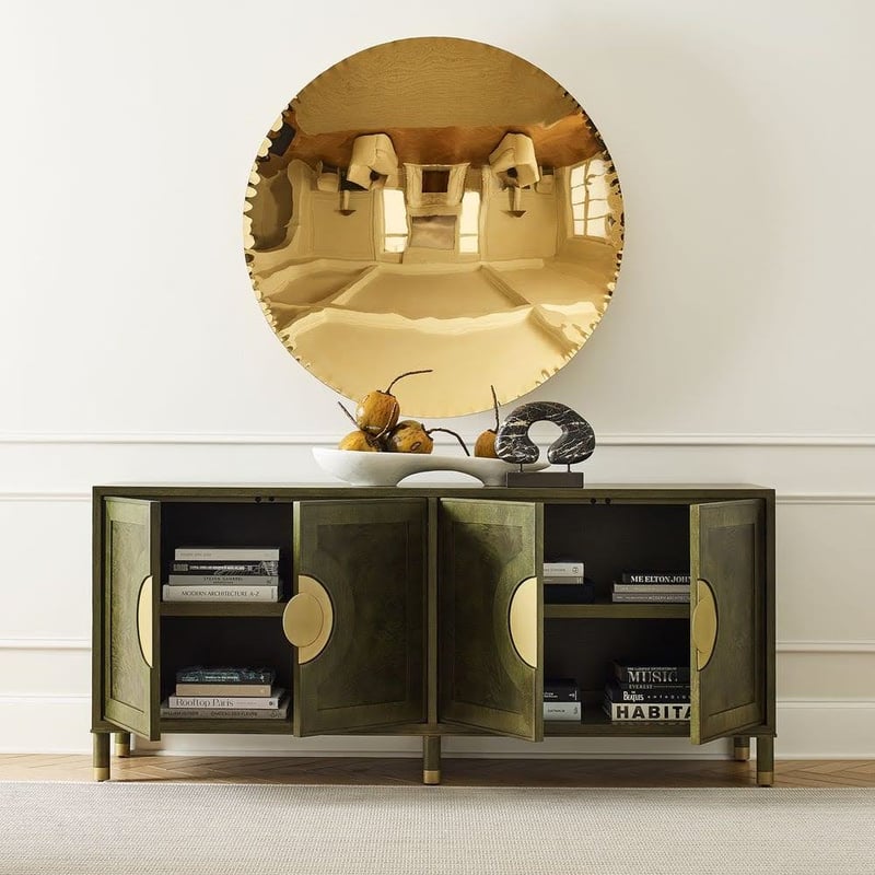 Uttermost Olive Green Horizontal Dresser, gold circle hangs above it