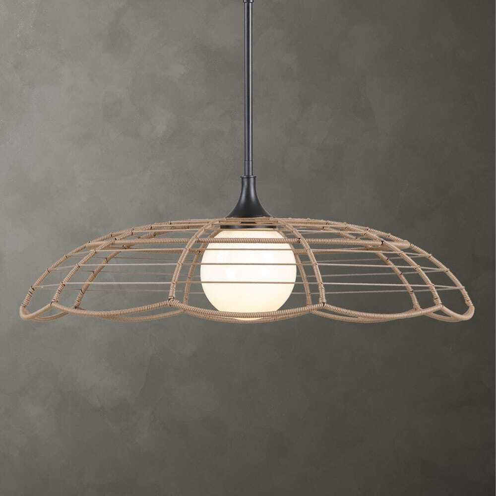 Pendant light with a woven, cage-like shade over a globe bulb