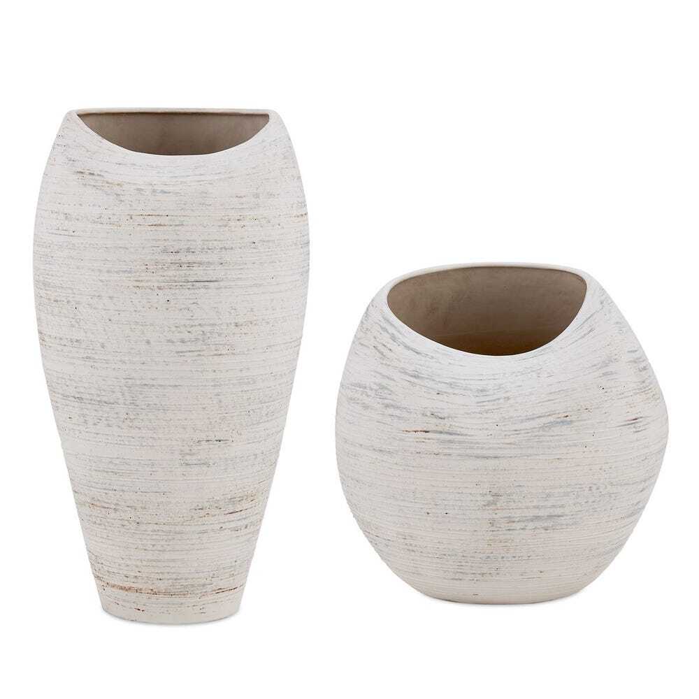 pair of earthenware vases is covered in a creamy white finish with subtle blue and rust brushstrokes